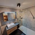 Salle de bain moderne après rénovation à Chimay